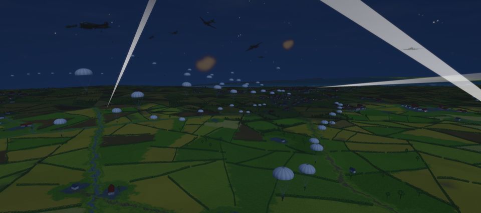 Paratroopers dropping at night under searchlights