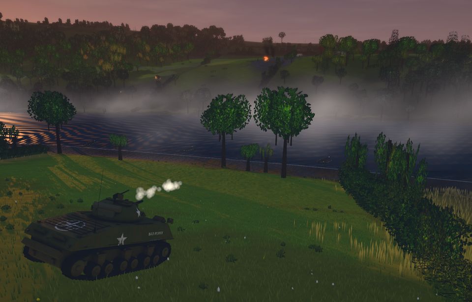 A tank destroyer firing across a misty river